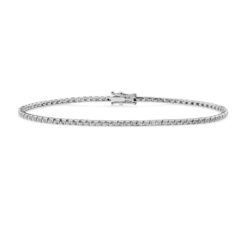 Bracciale unisex Comete Tennis BRT 286 M17 Realizzato in oro 750 con diamanti caratterizzati da un punto di caratura 35, colore g e purezza si. Gioiello della lunghezza di 17 cm. Modello: tennis diamantato rombo.